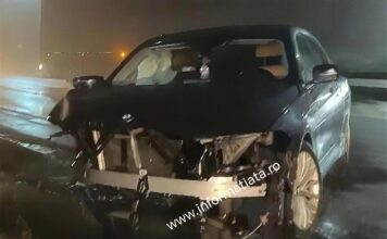 Doi răniți și trafic blocat după ce un BMW scăpat de sub control a lovit un alt vehicul FOTO